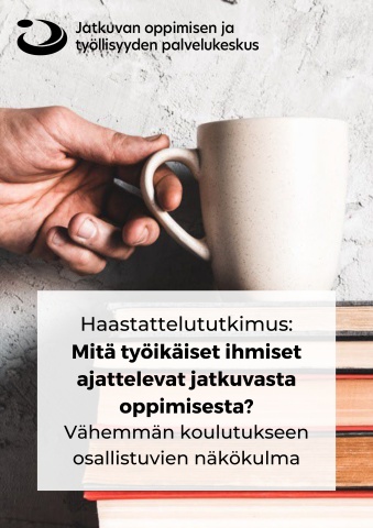 Kahvikuppi ja kirjoja